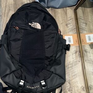 The North Face Black Backpack with Rose gold Logo/hardware